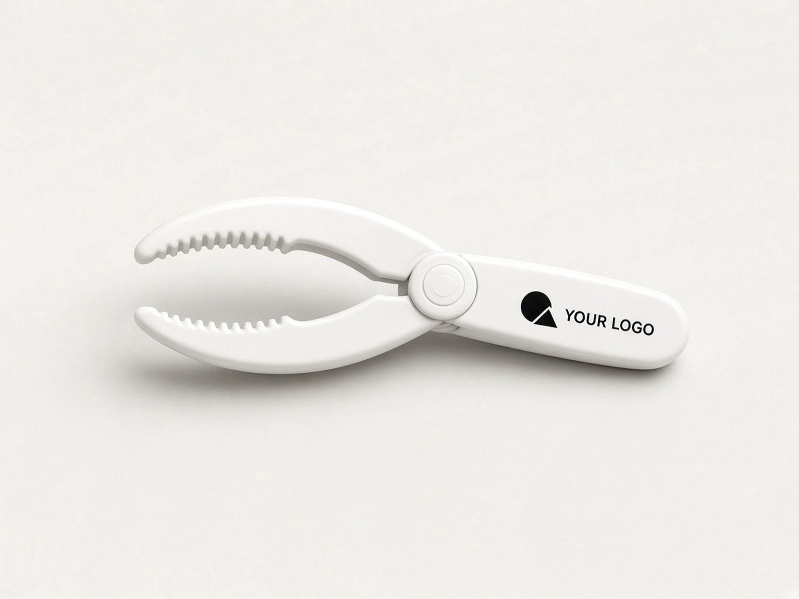 A white plastic crab cracker printed in black with an example logo on the handle.